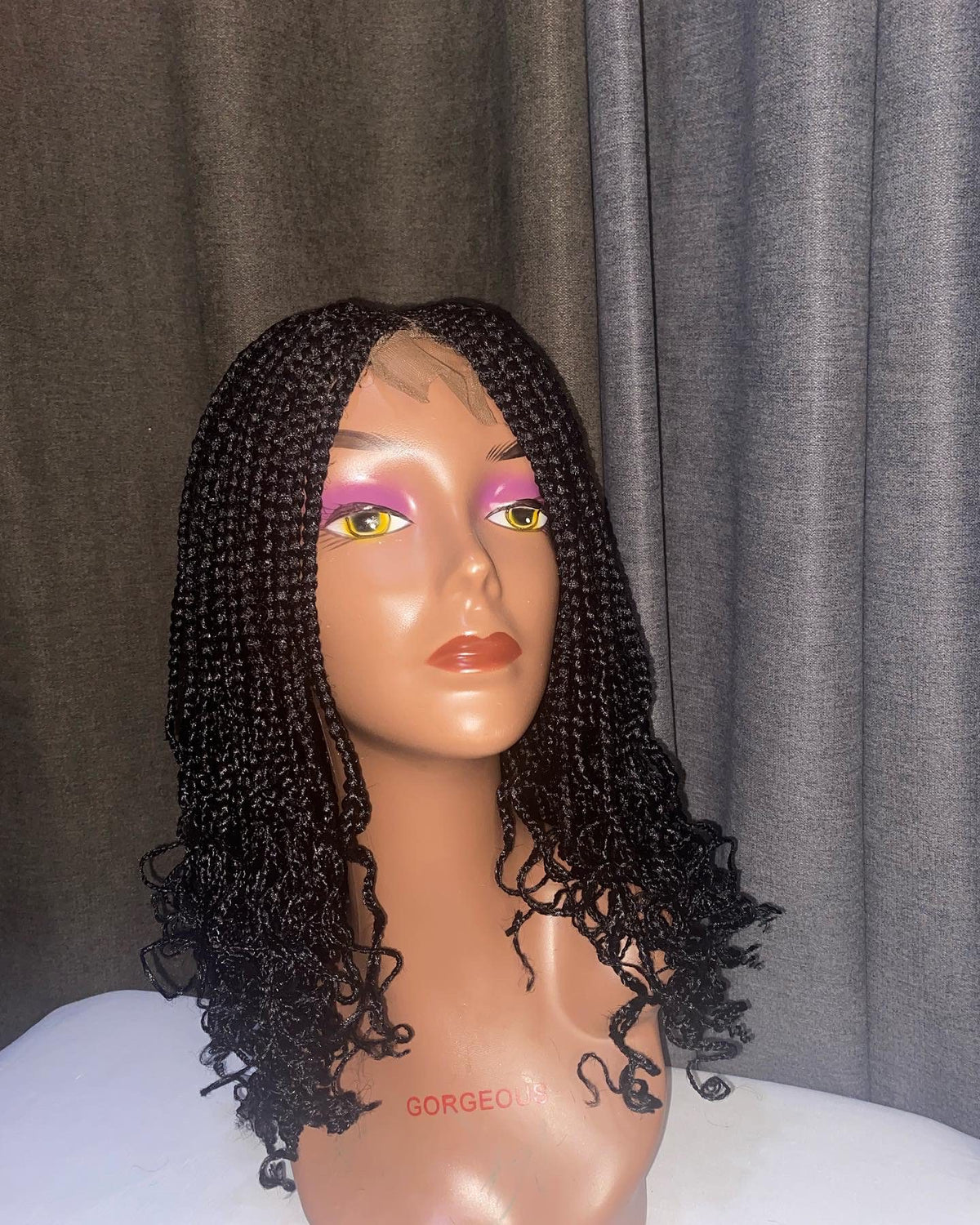 Cornrow braid with curly tip