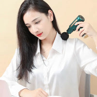 Professional 4-Head Mini Massage Gun – Rechargeable