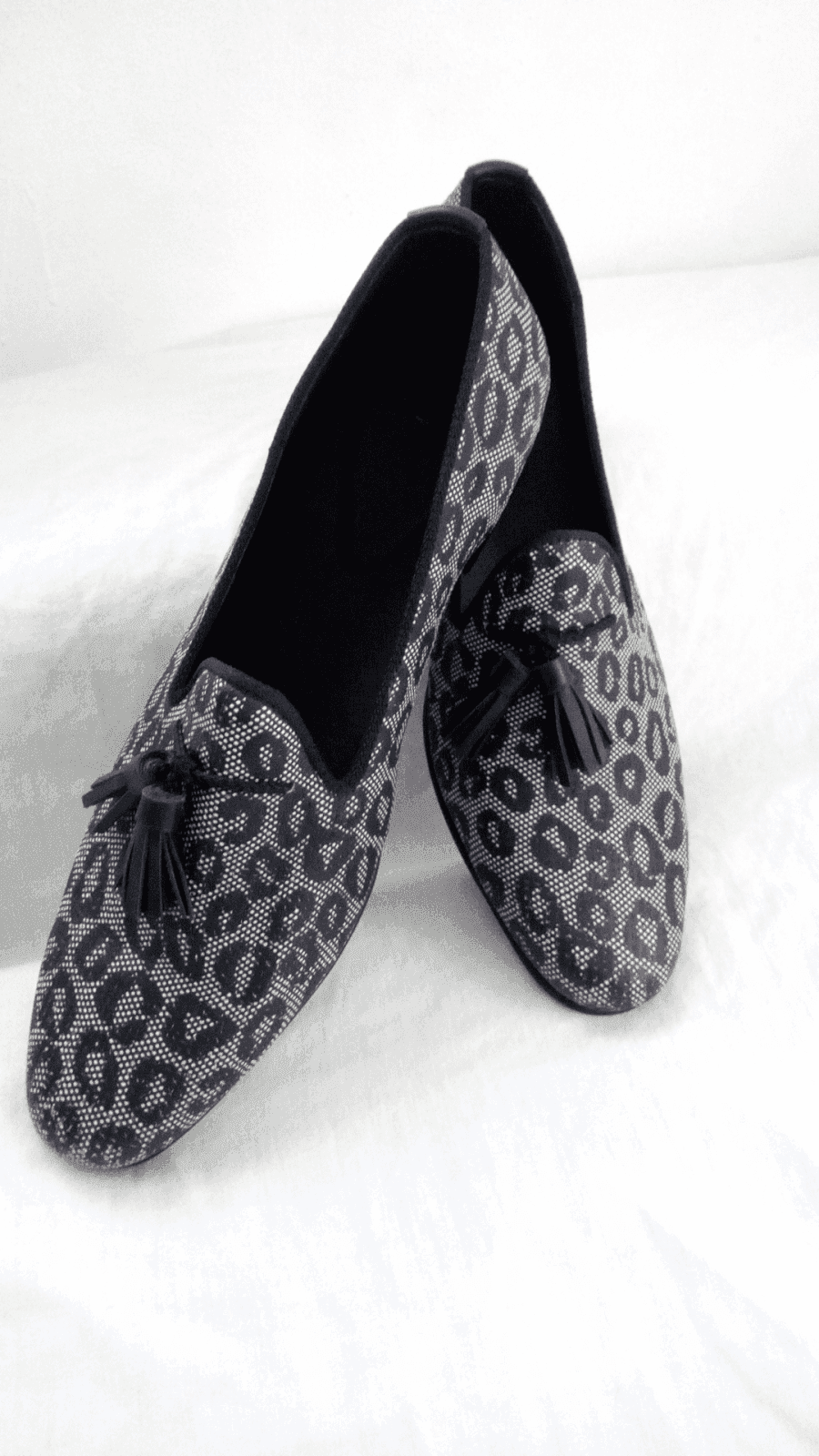 Spotted with ash pattern cloth-like with perforations