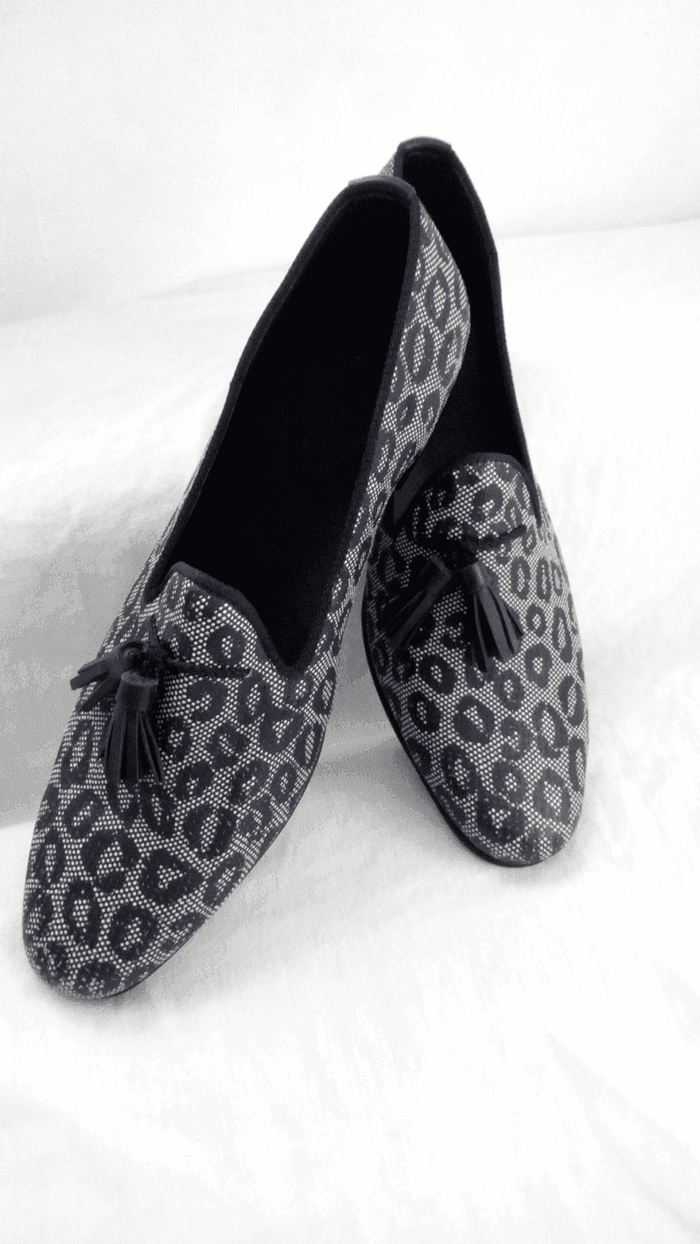 Spotted with ash pattern cloth-like with perforations