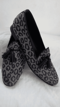 Spotted with ash pattern cloth-like with perforations